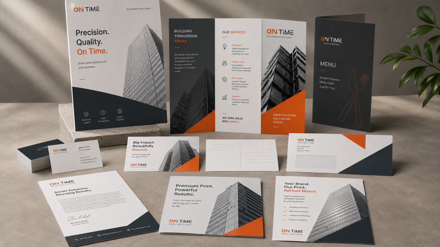 A clean collage of printed business materials and marketing pieces
